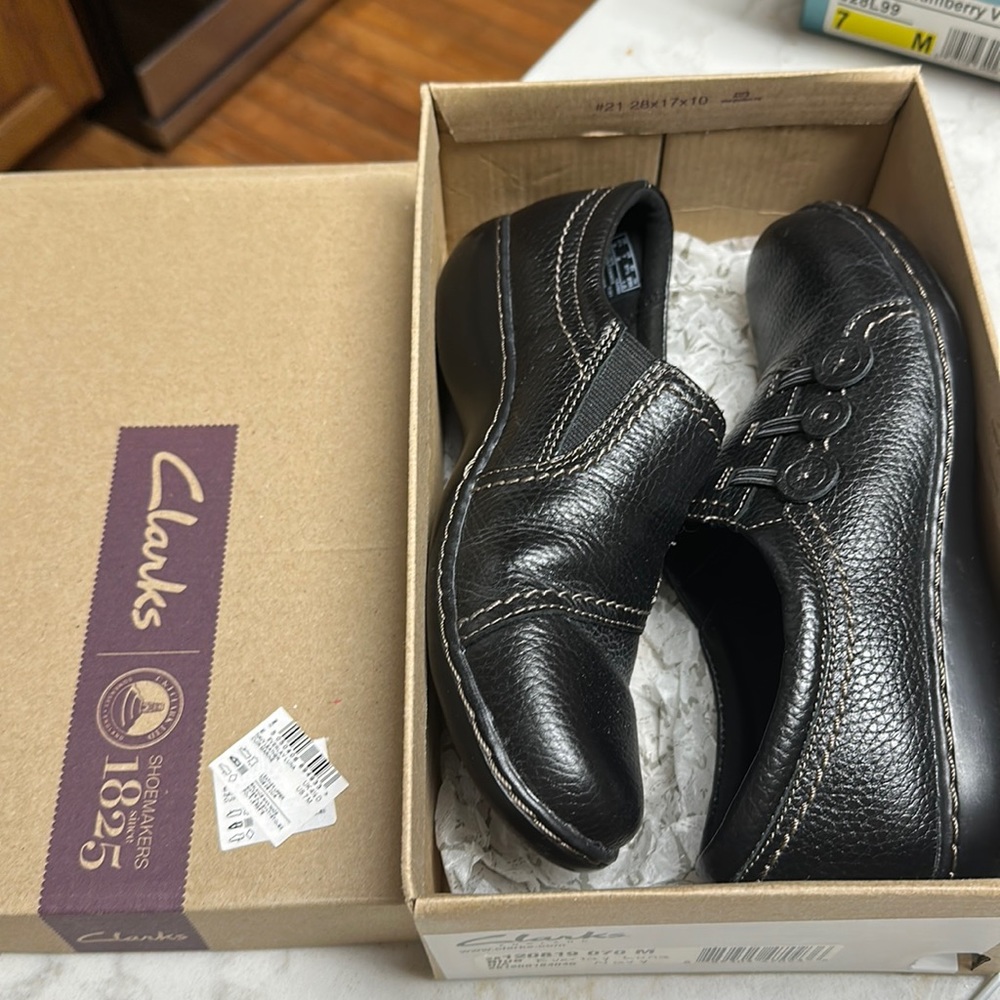 Clarks shoes. Button detailed. New in box. Never worn. Size 7